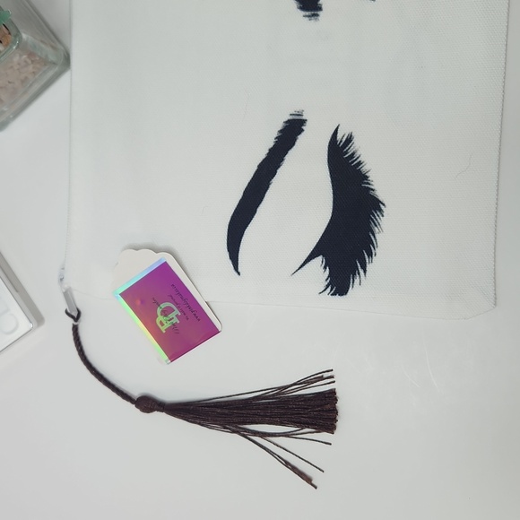 Canvas Cosmetic Bag With Fun Winking Eye And Tassel - Picture 3 of 4